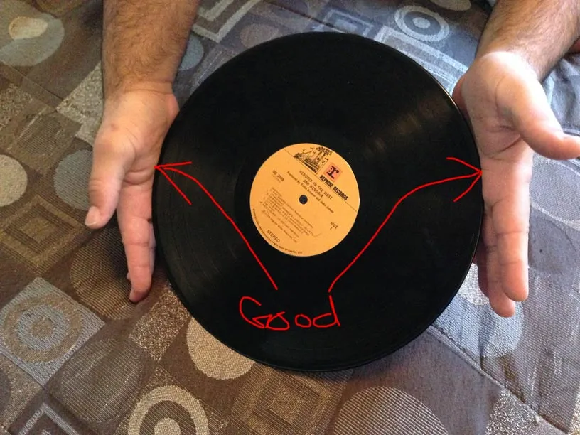 Should you not touch vinyl records?