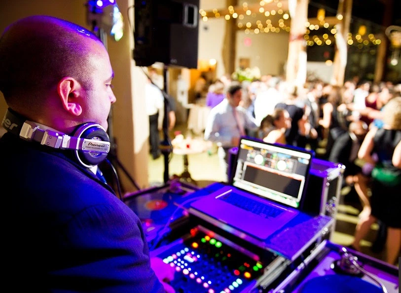 How many songs does a DJ play at a wedding?