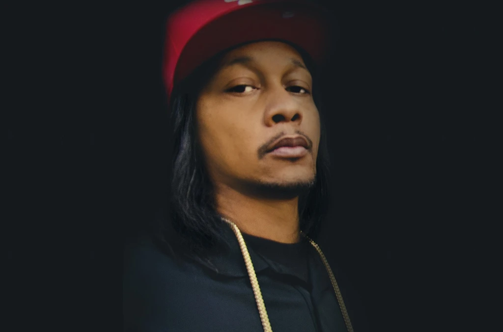 How tall is DJ Quik?