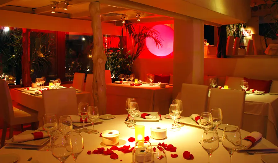 What is the minimum spend at Pacha Ibiza Restaurant?