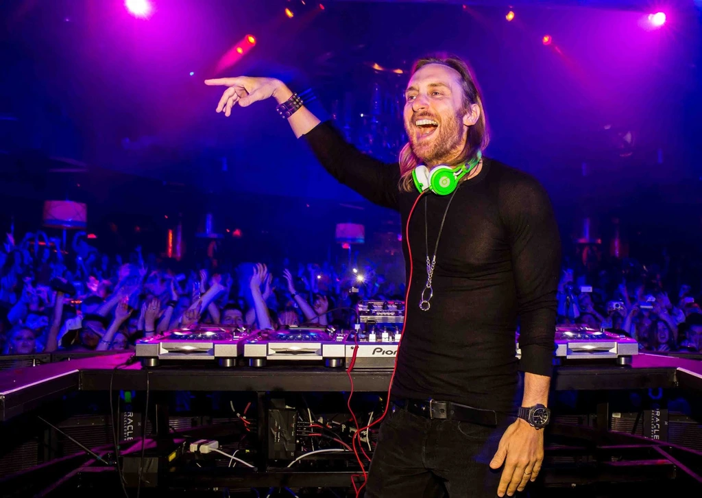 What is David Guetta doing on stage?