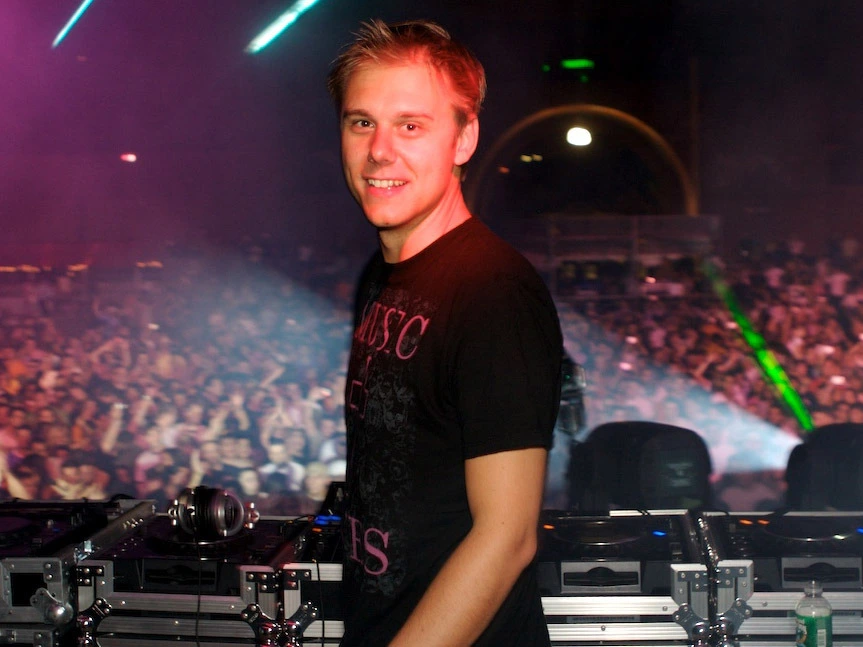 What genre of EDM is the Dutch DJ musician and remixer Armin van Buuren most well known for?