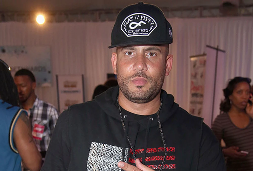 Who is DJ drama signed to?