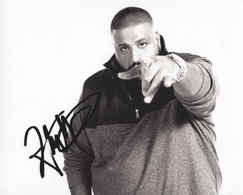 Who signed DJ Khaled first?