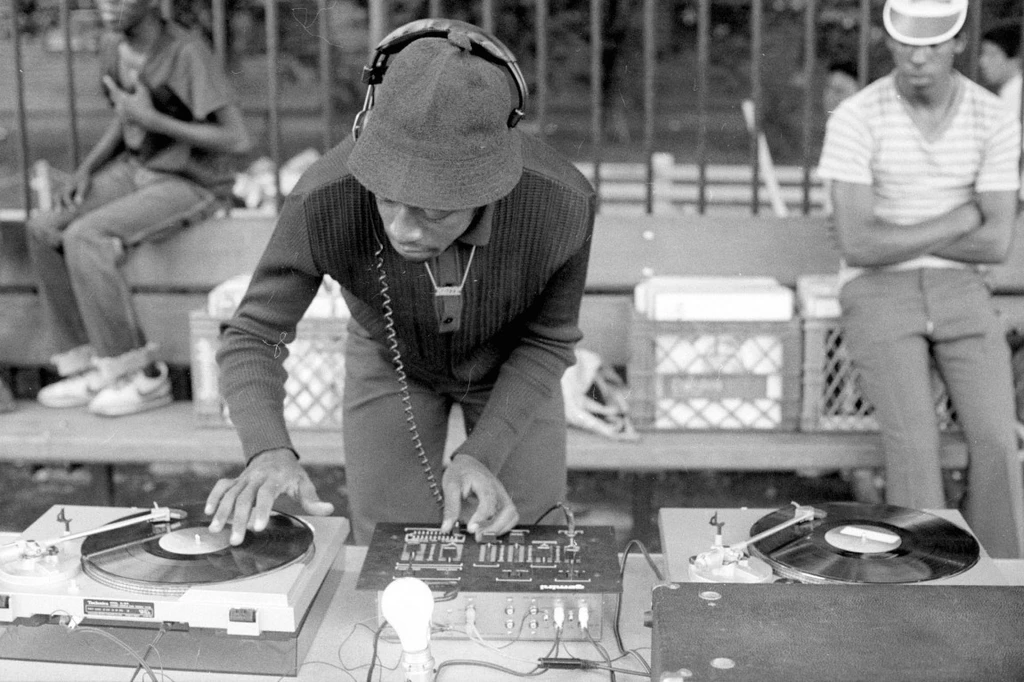 Who was considered the first hip-hop DJ of street parties when rap music was just beginning?