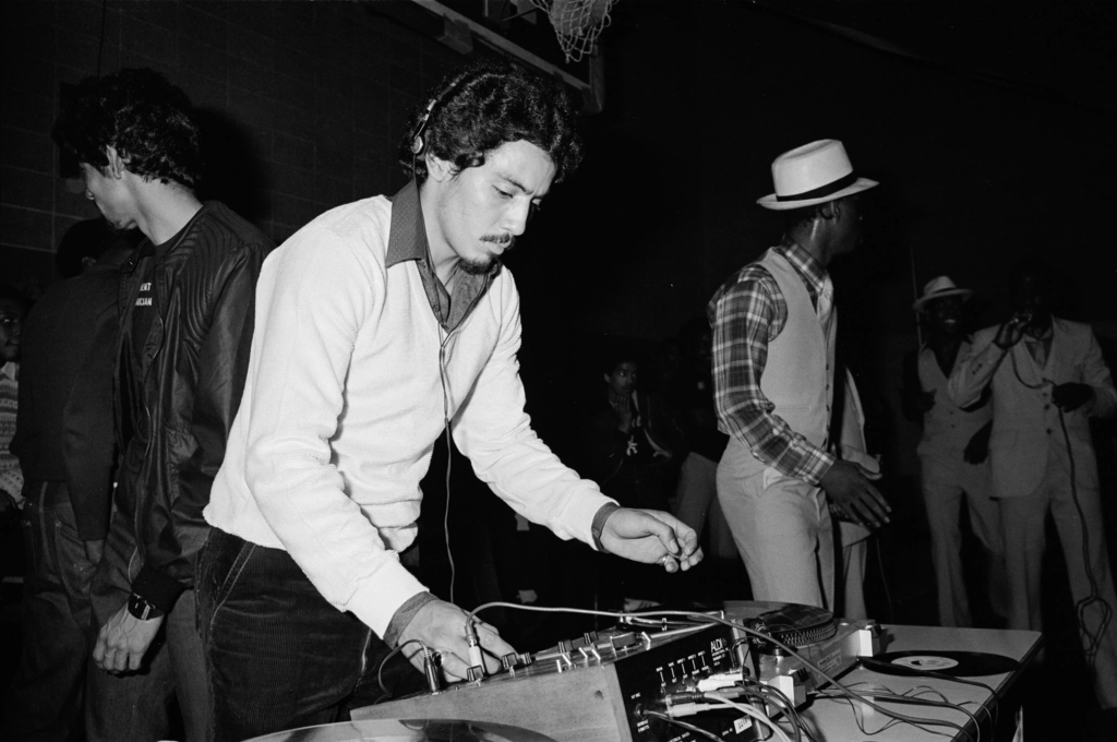 What role did the DJ play in the history of hip-hop?