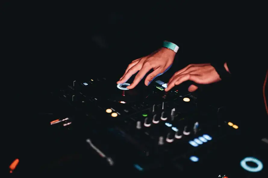 Why do DJs move their hands?
